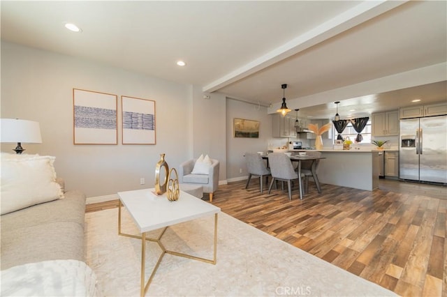 1223 S Golden W Ave Unit F, Arcadia, CA 91007 - living area with wood finished floors, recessed lighting, and beam ceiling