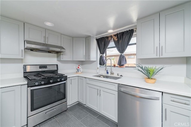 1223 S Golden W Ave Unit F, Arcadia, CA 91007 - kitchen featuring stainless steel appliances, under cabinet range hood, light countertops, dark tile patterned floors, and recessed lighting
