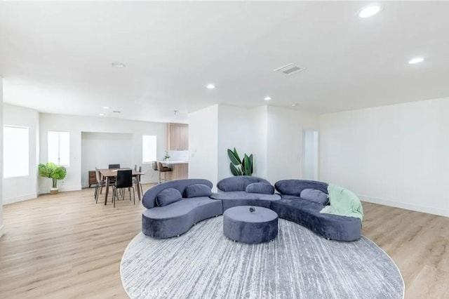 18134 Chase St, Northridge, CA 91325 - living area featuring light wood-style floors and recessed lighting