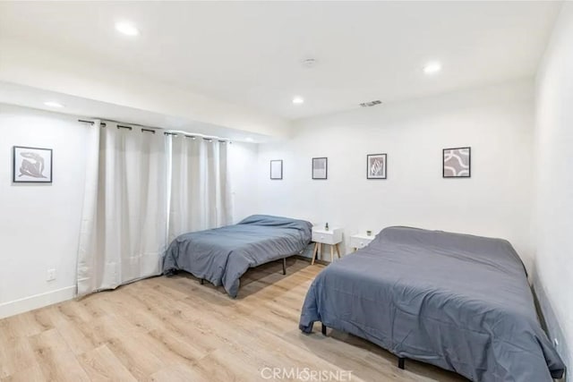 18134 Chase St, Northridge, CA 91325 - bedroom with light wood finished floors and recessed lighting