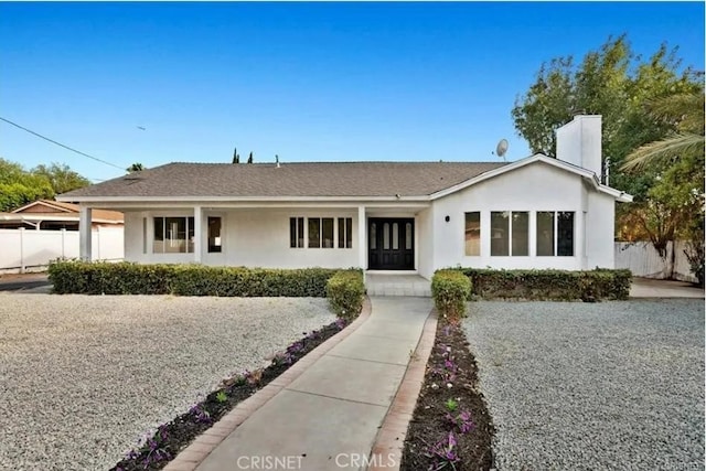 18134 Chase St, Northridge, CA 91325 - single story home featuring stucco siding and a chimney