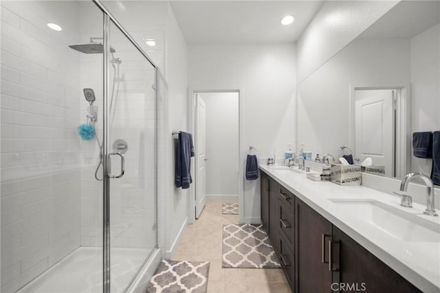1742 Heywood St Unit C, Simi Valley, CA 93065 - bathroom featuring a stall shower, double vanity, tile patterned flooring, and recessed lighting