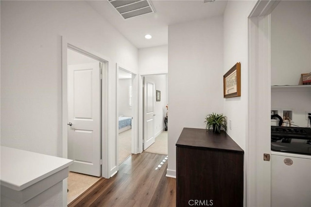 1742 Heywood St Unit C, Simi Valley, CA 93065 - hallway with wood finished floors, recessed lighting, and washer / clothes dryer