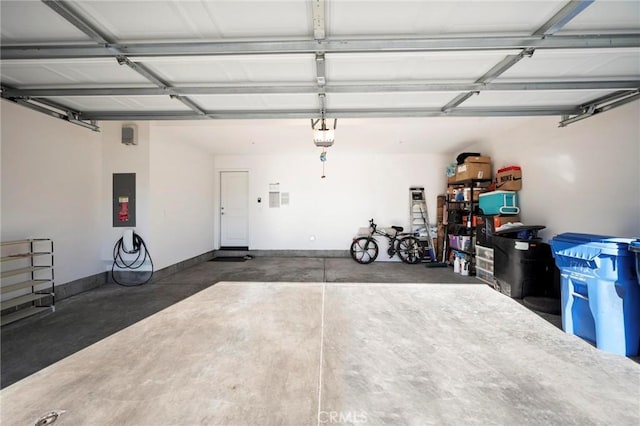 1742 Heywood St Unit C, Simi Valley, CA 93065 - garage with electric panel and a garage door opener