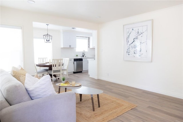 4622 Sunnyside Dr, Riverside, CA 92506 - living area featuring light wood finished floors and baseboards