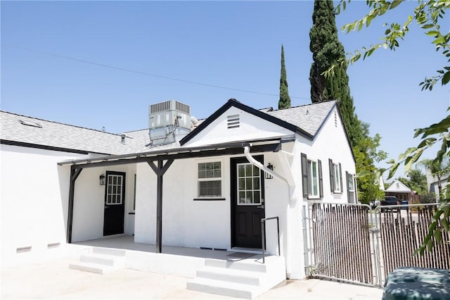 4622 Sunnyside Dr, Riverside, CA 92506 - view of front of home featuring stucco siding and roof with shingles