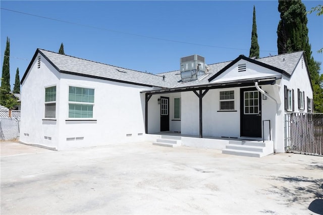 4622 Sunnyside Dr, Riverside, CA 92506 - back of property with stucco siding, crawl space, and a shingled roof