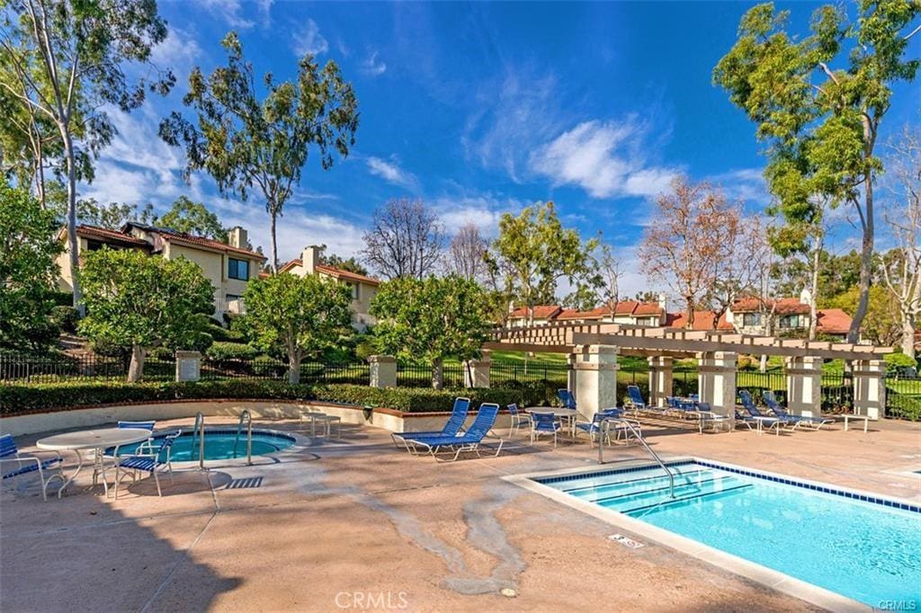 2320 Sandbar Dr Unit 170, Fullerton, CA 92833 - community pool featuring a hot tub, a patio area, and a pergola