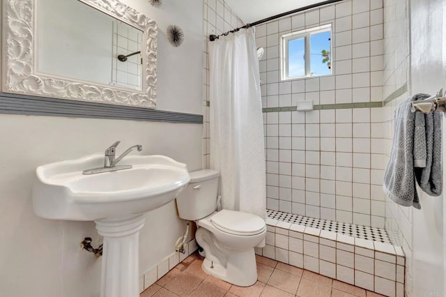 133 Lotus Dr, Chula Vista, CA 91911 - full bath with a tile shower and tile patterned flooring
