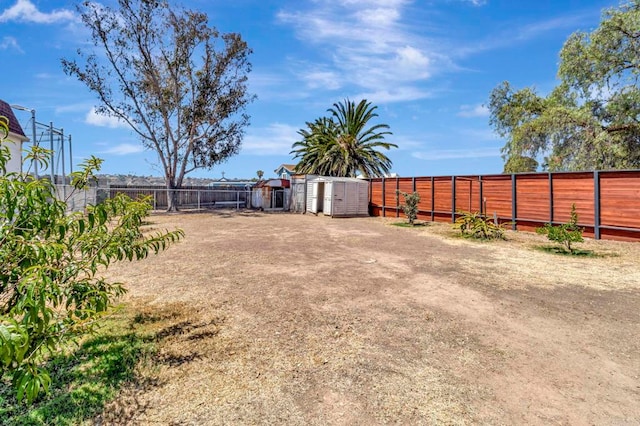 133 Lotus Dr, Chula Vista, CA 91911 - fenced backyard with a storage unit