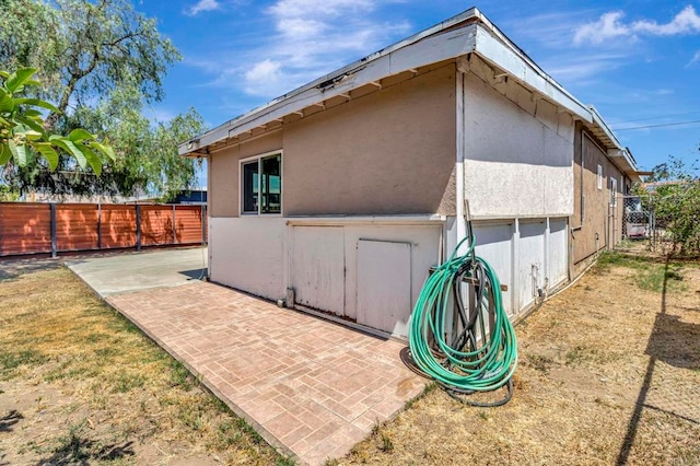 133 Lotus Dr, Chula Vista, CA 91911 - back of property with a patio and stucco siding