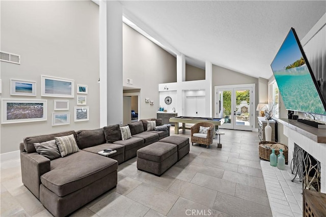1119 Grove Ln, Newport Beach, CA 92660 - living area with high vaulted ceiling, a fireplace, and french doors