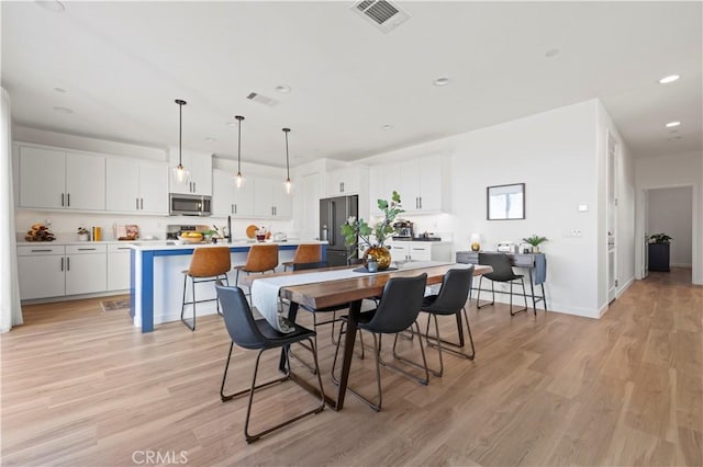 28537 Daybreak Way, Saugus, CA 91350 - dining area featuring recessed lighting and light wood finished floors