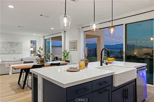 28537 Daybreak Way, Saugus, CA 91350 - kitchen featuring light wood finished floors, open floor plan, light countertops, dishwasher, and recessed lighting