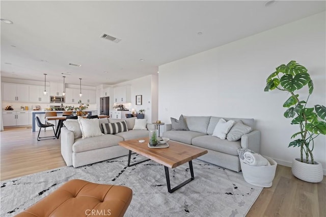 28537 Daybreak Way, Saugus, CA 91350 - living area with light wood-style floors