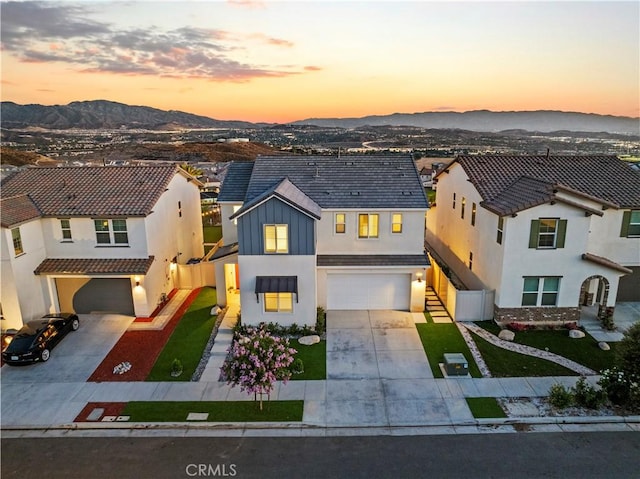 28537 Daybreak Way, Saugus, CA 91350 - view of front of property with an attached garage, concrete driveway, and a mountain view