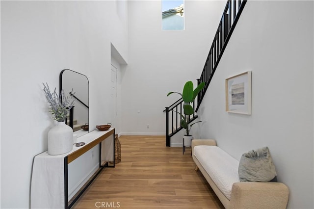 28537 Daybreak Way, Saugus, CA 91350 - foyer with stairway, light wood-style floors, and a towering ceiling