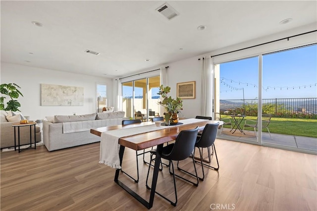 28537 Daybreak Way, Saugus, CA 91350 - dining space featuring light wood finished floors and recessed lighting