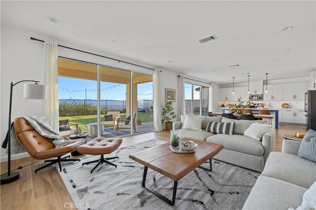 28537 Daybreak Way, Saugus, CA 91350 - living area featuring light wood-type flooring
