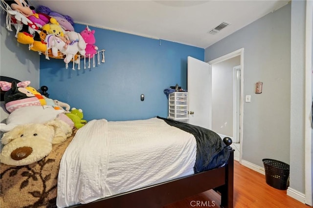 4435 Los Serranos Blvd, Chino Hills, CA 91709 - bedroom featuring wood finished floors and baseboards