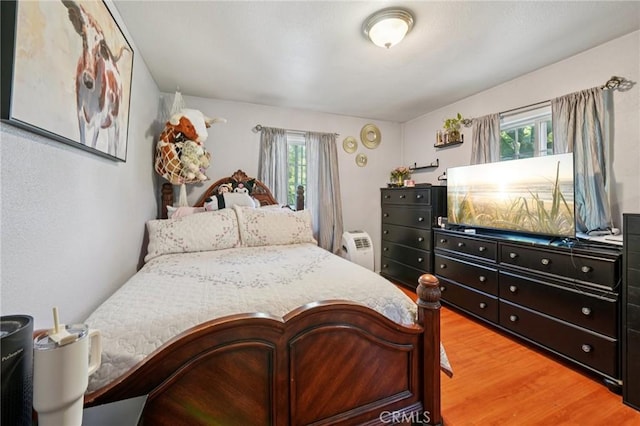 4435 Los Serranos Blvd, Chino Hills, CA 91709 - bedroom with multiple windows and light wood-style floors