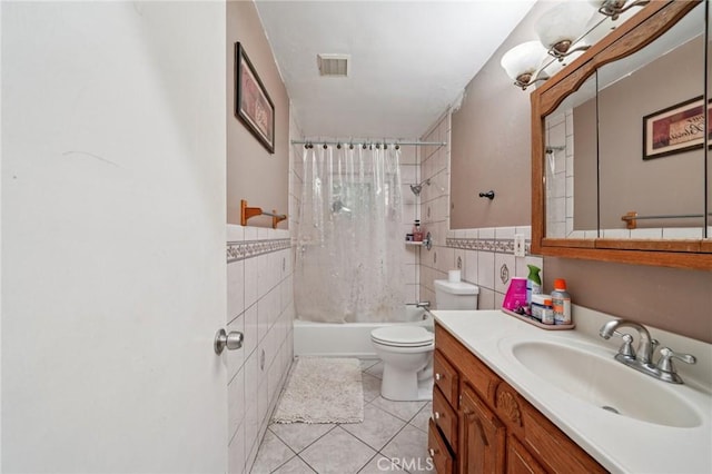 4435 Los Serranos Blvd, Chino Hills, CA 91709 - full bath with tile walls, vanity, tile patterned flooring, shower / tub combo, and a wainscoted wall