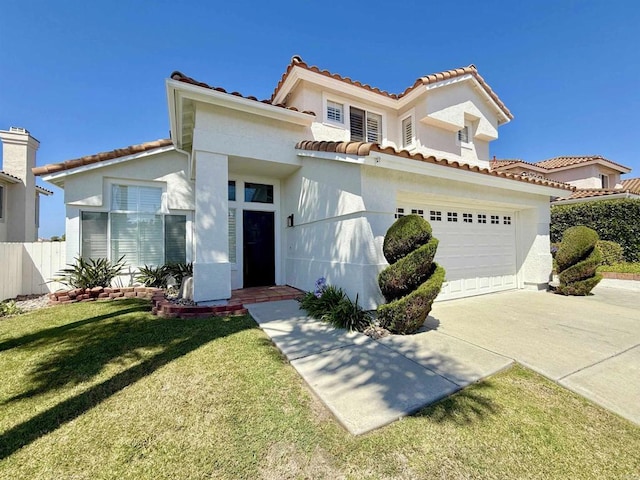 653 Montage Rd, Oceanside, CA 92057 - mediterranean / spanish-style house with driveway, stucco siding, and a tile roof