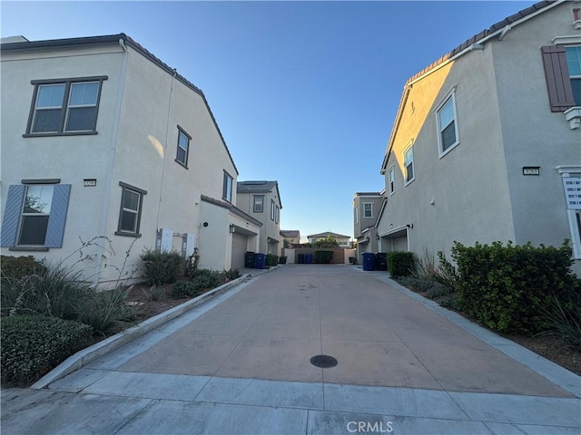 3249 E Butterfly Ln, Ontario, CA 91762 - view of concrete road with a residential view