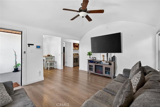 8627 John Ave, Los Angeles, CA 90002 - living area featuring a ceiling fan, wood finished floors, and vaulted ceiling
