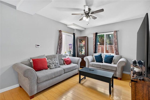 8627 John Ave, Los Angeles, CA 90002 - living room featuring a ceiling fan and light wood-style flooring
