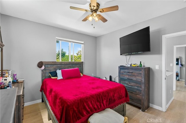 8627 John Ave, Los Angeles, CA 90002 - bedroom with light wood-type flooring and a ceiling fan
