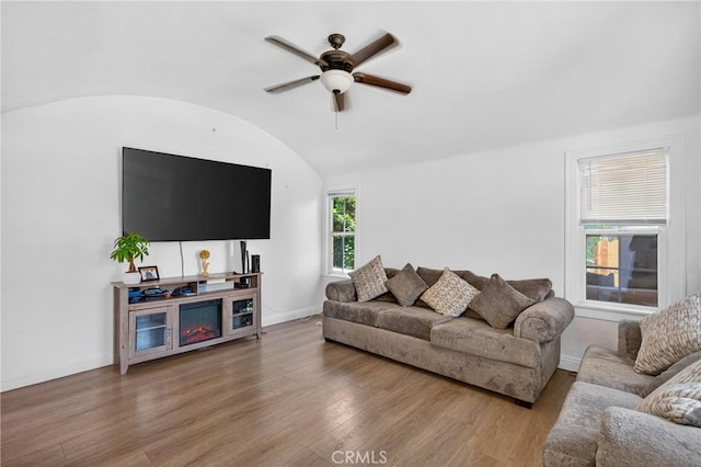 8627 John Ave, Los Angeles, CA 90002 - living room featuring a ceiling fan, wood finished floors, and lofted ceiling