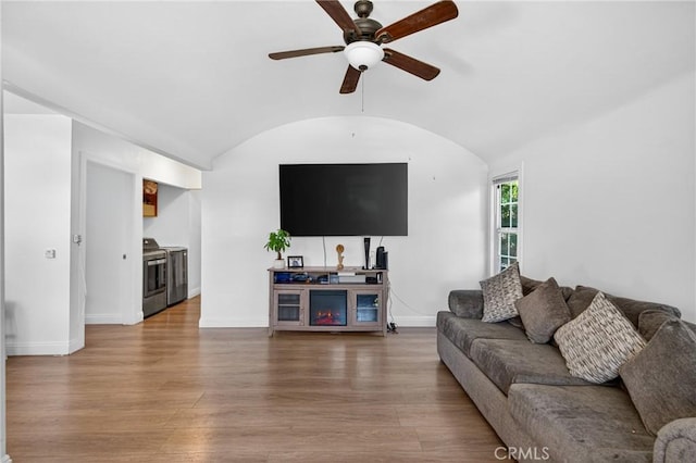 8627 John Ave, Los Angeles, CA 90002 - living room featuring a ceiling fan, wood finished floors, and vaulted ceiling