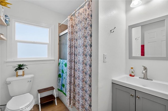 8627 John Ave, Los Angeles, CA 90002 - bathroom with vanity, curtained shower, and wood finished floors