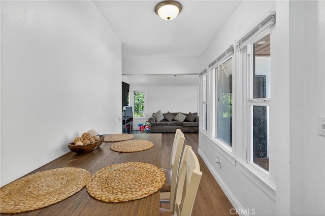 8627 John Ave, Los Angeles, CA 90002 - dining area with wood finished floors and baseboards