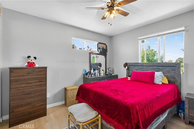 8627 John Ave, Los Angeles, CA 90002 - bedroom featuring wood finished floors and a ceiling fan