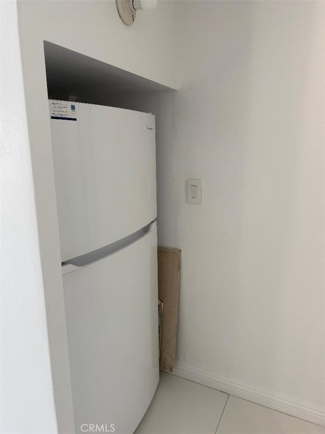 14730 S Normandie Ave Unit 3, Gardena, CA 90247 - kitchen with freestanding refrigerator and light tile patterned flooring