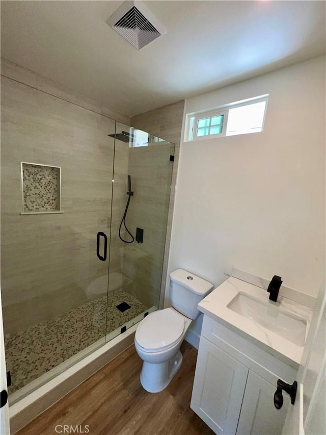 1737 W 65th Pl, Los Angeles, CA 90047 - bathroom with wood finished floors, a shower stall, and vanity