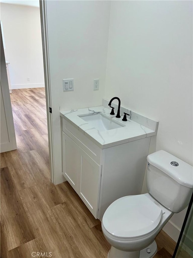 1737 W 65th Pl, Los Angeles, CA 90047 - bathroom with wood finished floors and vanity