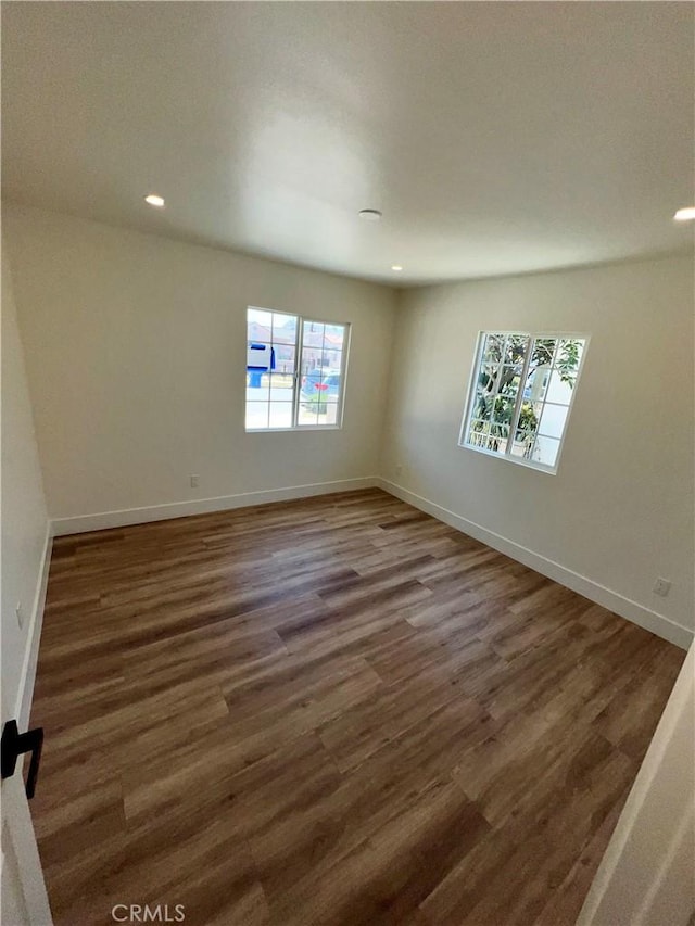 1737 W 65th Pl, Los Angeles, CA 90047 - spare room featuring plenty of natural light, wood finished floors, and recessed lighting