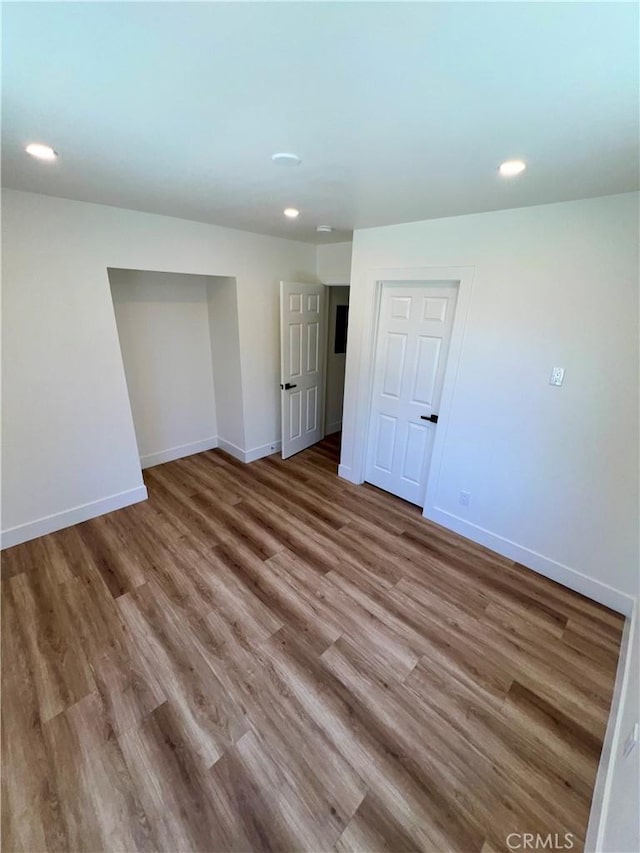 1737 W 65th Pl, Los Angeles, CA 90047 - spare room featuring wood finished floors and recessed lighting