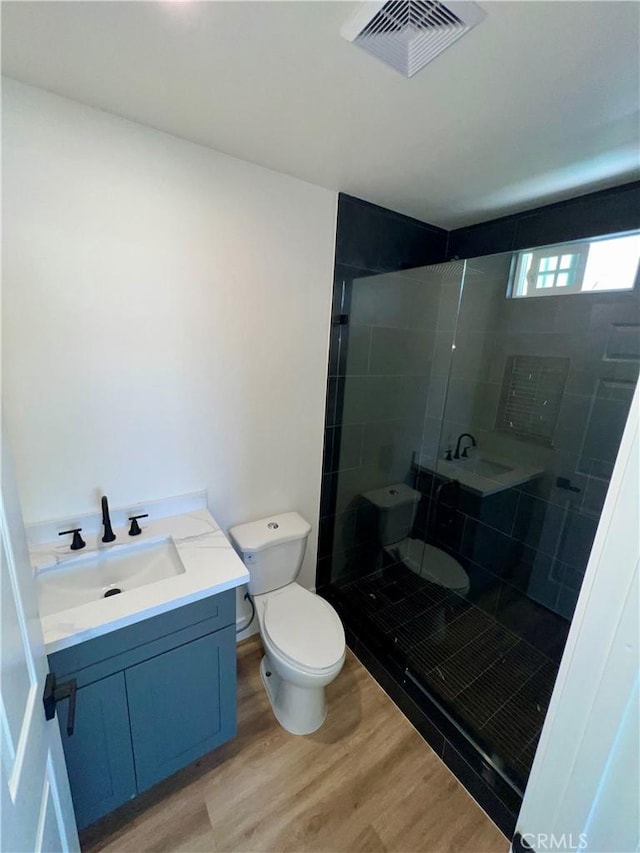 1737 W 65th Pl, Los Angeles, CA 90047 - full bath with vanity, a tile shower, and wood finished floors