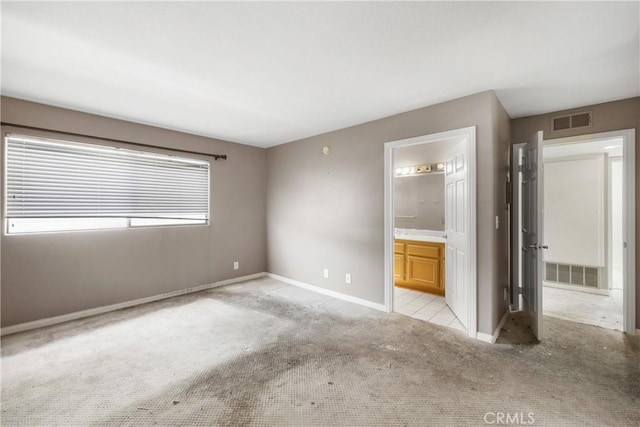 2222 S Mesa St Unit 8, San Pedro, CA 90731 - unfurnished bedroom with light carpet and ensuite bathroom
