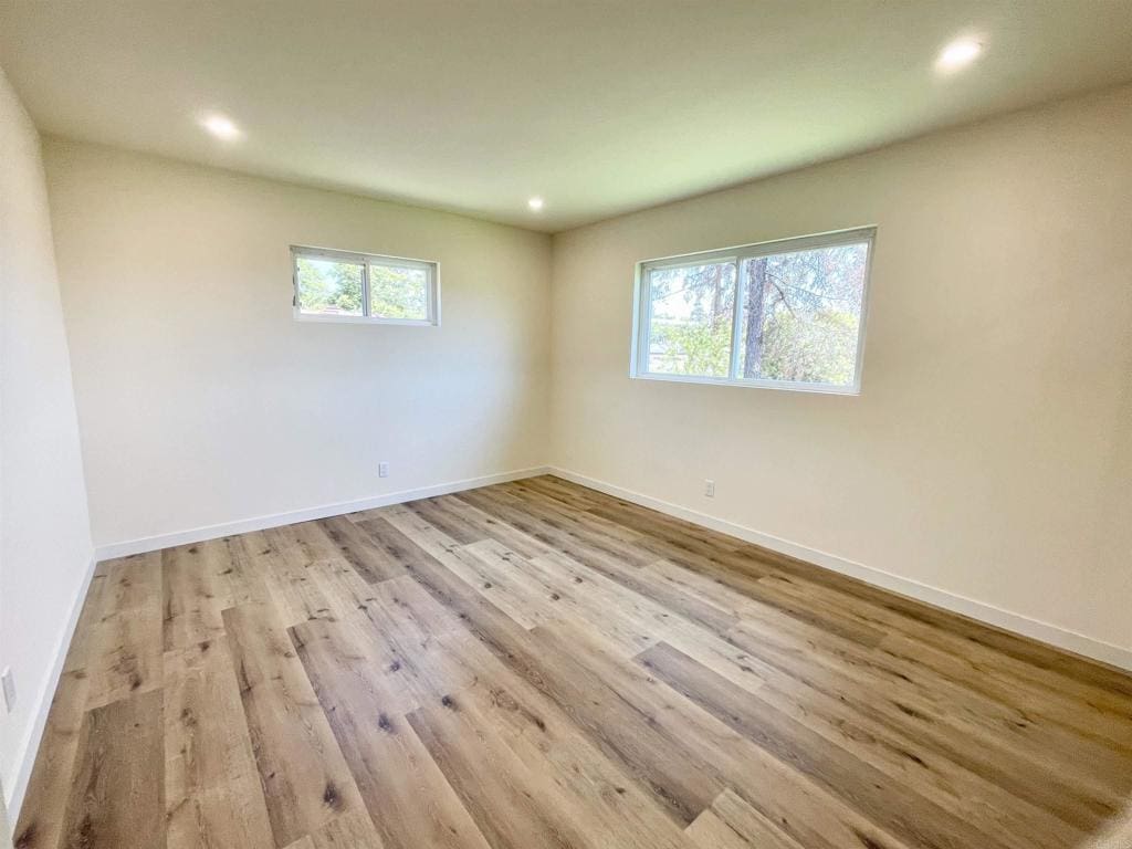 7855 Montana St, Lemon Grove, CA 91945 - spare room featuring wood finished floors and recessed lighting