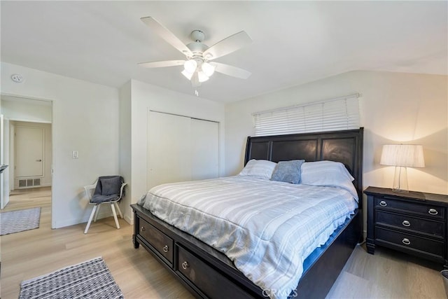 14453 Watkins Dr, La Mirada, CA 90638 - bedroom with a closet, light wood-type flooring, and a ceiling fan