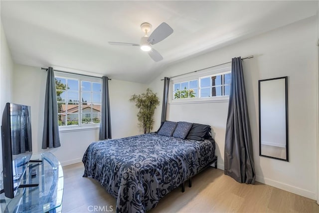 14453 Watkins Dr, La Mirada, CA 90638 - bedroom featuring light wood-style floors, vaulted ceiling, and ceiling fan