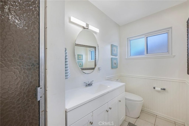 14453 Watkins Dr, La Mirada, CA 90638 - bathroom with wainscoting, vanity, and tile patterned flooring