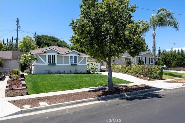 14453 Watkins Dr, La Mirada, CA 90638 - ranch-style house featuring a front yard and stucco siding