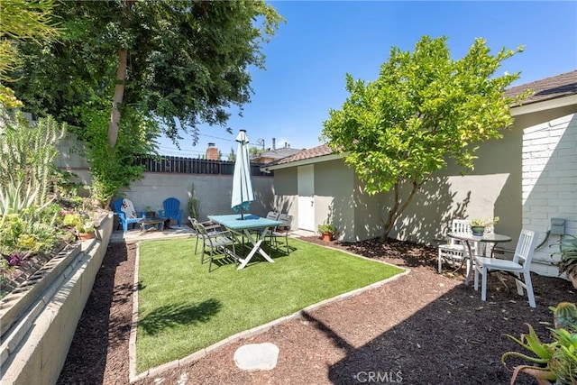14453 Watkins Dr, La Mirada, CA 90638 - view of yard featuring outdoor dining space and a patio