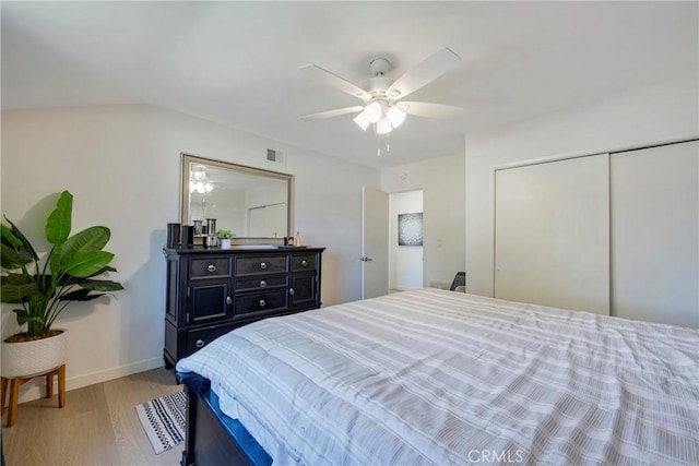 14453 Watkins Dr, La Mirada, CA 90638 - bedroom with light wood-style flooring, a closet, and a ceiling fan